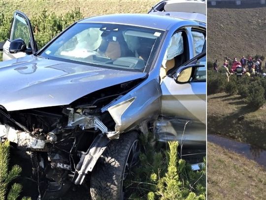 Groźny wypadek BMW na autostradzie. Auto przebiło bariery i zjechało ze skarpy [ZDJĘCIA]