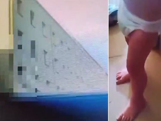 Trzylatek w pieluszce stał w oknie na trzecim piętrze. Ojciec dziecka spacerował z psem