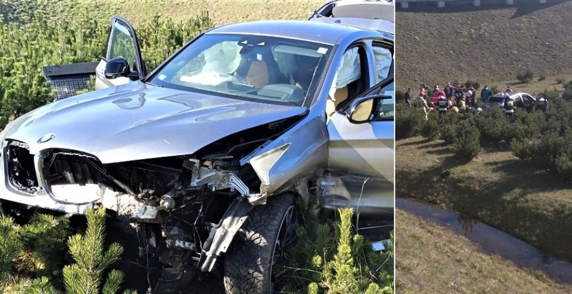 Groźny wypadek BMW na autostradzie. Auto przebiło bariery i zjechało ze skarpy [ZDJĘCIA]